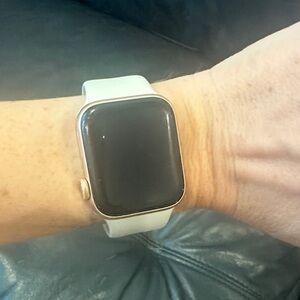 Rose Gold Apple Watch SE with Taupe Band